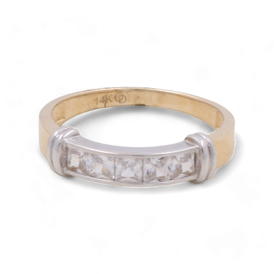 The 14K Yellow and White Gold Wedding Ring with Zirconia from Miral Jewelry features a segment with five rectangular cut diamonds set in white gold, making it perfect for celebrating your special day.