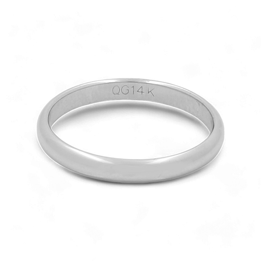 A simple, polished 14K white gold wedding band from Miral Jewelry, engraved with "QG14K" on the inside of the band. Perfect as a luxury men's ring, it offers timeless elegance and sophistication.