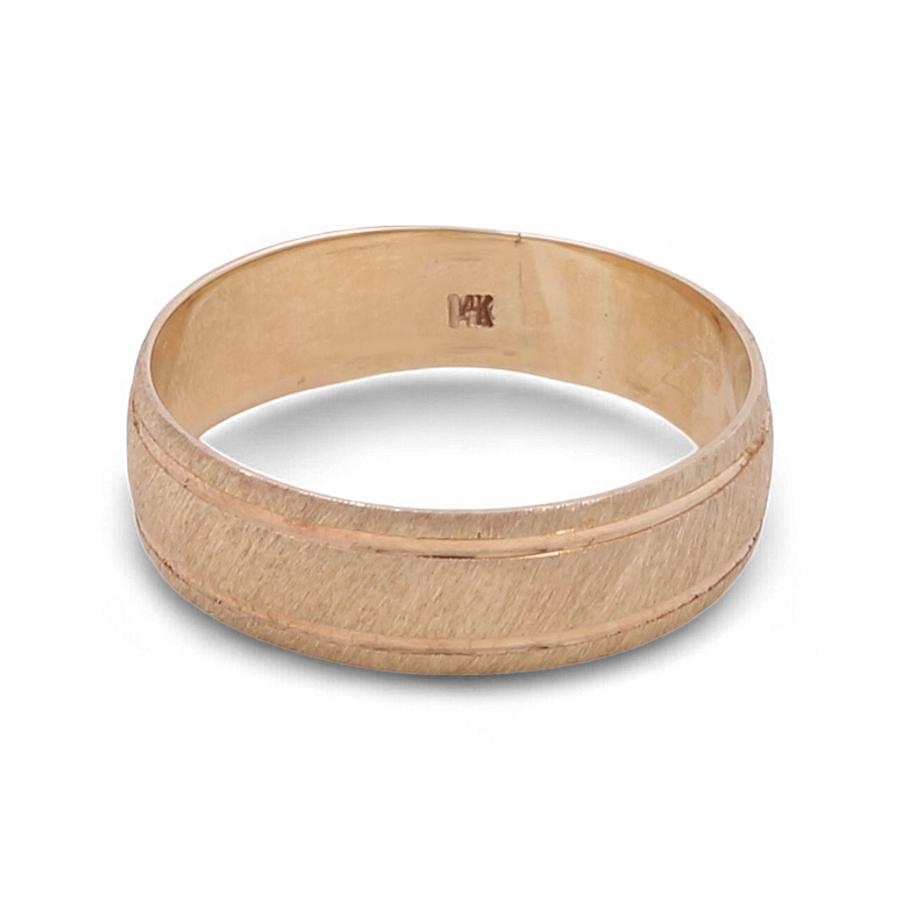 A men's wedding band from Miral Jewelry, crafted in 14K yellow gold, featuring a brushed finish and a polished trim, marked with "14K" on the inner side.