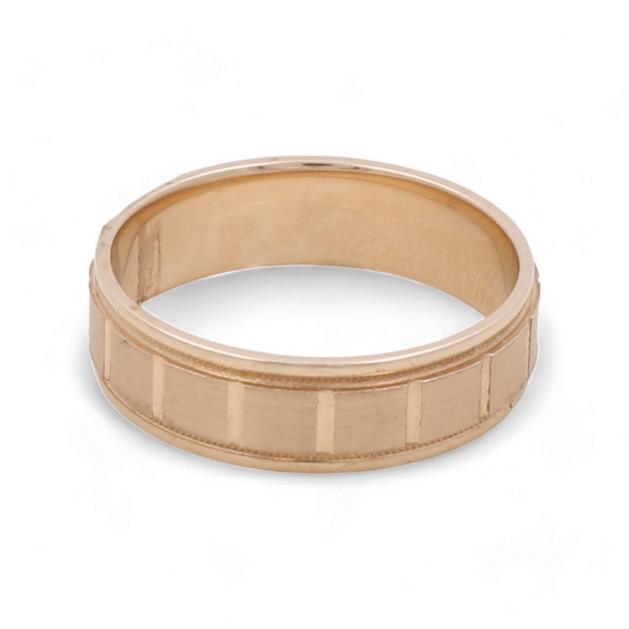 The Miral Jewelry 14K Yellow Gold Wedding Band Men Ring features a smooth finish with subtle vertical ridges on the outer surface, making it a timeless choice for a wedding band.