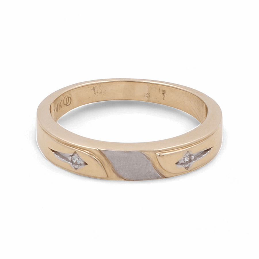 A 14K Yellow and White Gold Wedding Band for men by Miral Jewelry, featuring zirconia inlays symmetrically positioned on either side of a central, unembellished section.