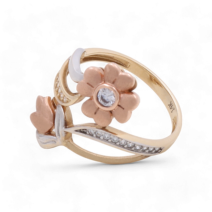 A luxury accessory for any collection, the Miral Jewelry 14K Yellow, White and Rose Gold Flower Fashion Women's Ring with Zirconia features a central gemstone surrounded by intricate petal designs and small embedded stones on part of the band. Perfect as a timeless fashion piece, this ring is marked with "14K.