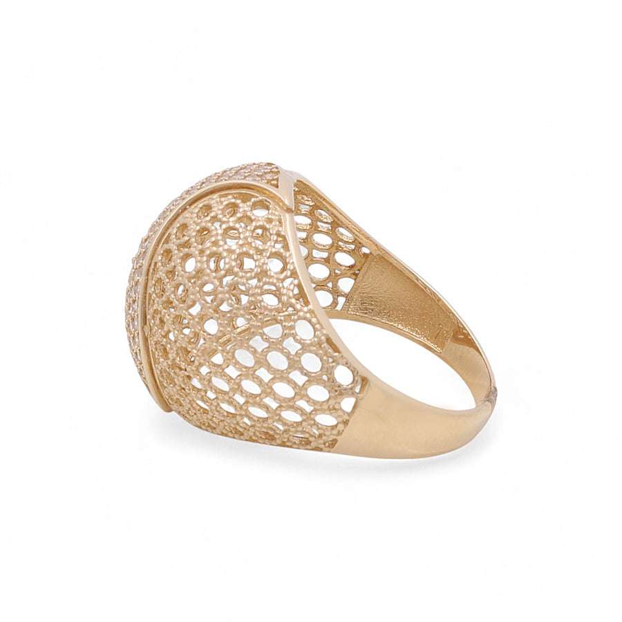 Miral Jewelry's 14K Yellow Gold Fashion Women's Ring with Cubic Zirconias boasts an intricate, openwork design that features small circular cutouts and a rounded top.