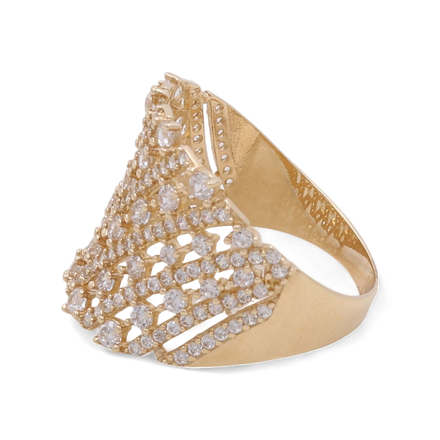 The Miral Jewelry 14K Yellow Gold Fashion Women Ring showcases an intricate perforated design adorned with numerous sparkling cubic zirconia stones.