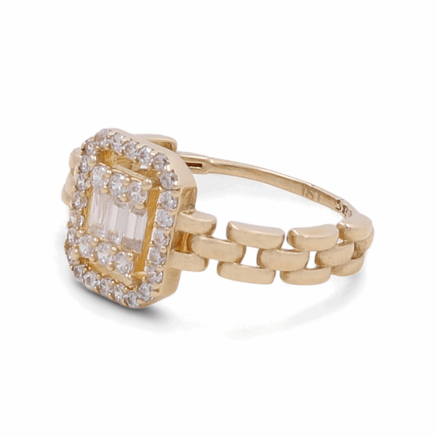 The Miral Jewelry 14K Yellow Gold Engagement Women's Ring features a stunning square-set diamond surrounded by smaller stones and a distinctive linked band design, making it perfect for an engagement.