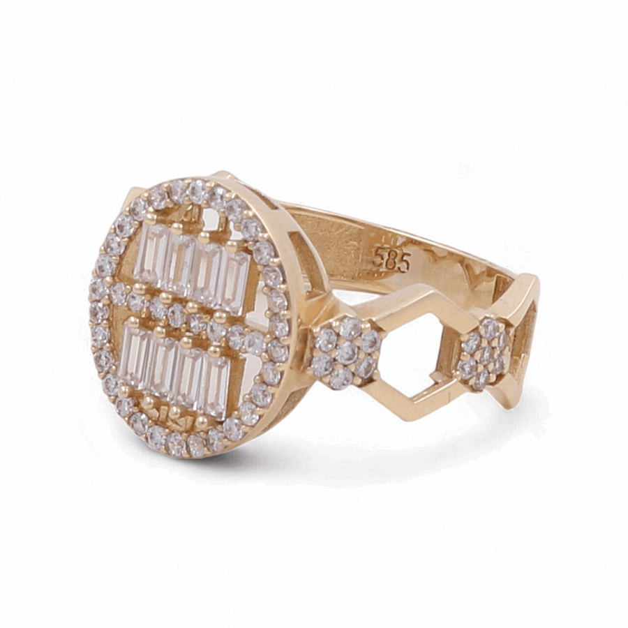 Miral Jewelry's 14K Yellow Gold Engagement Women's Ring boasts a circular face adorned with rectangular cubic zirconia stones and encircled by smaller round stones. The band features a geometric cut-out design, creating an absolutely stunning engagement ring.