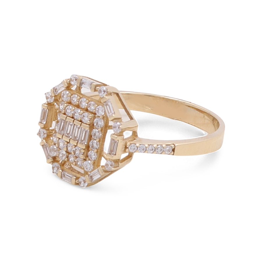 The Miral Jewelry 14K Yellow Gold Engagement Women's Ring boasts an elegant octagonal design accented with multiple small diamonds and a sleek band embellished with additional cubic zirconia stones.