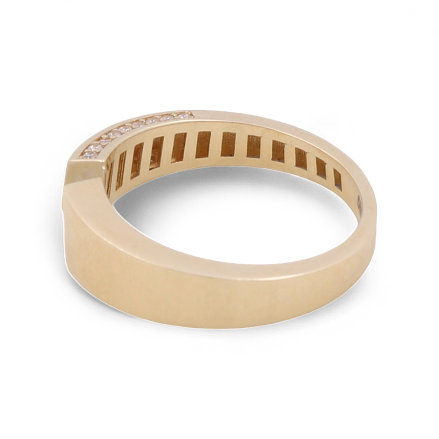 The 14K Yellow Gold Fashion Women Ring by Miral Jewelry showcases a unique angular design adorned with small cubic zirconia stones on one side of the band, making it a perfect accessory for women.