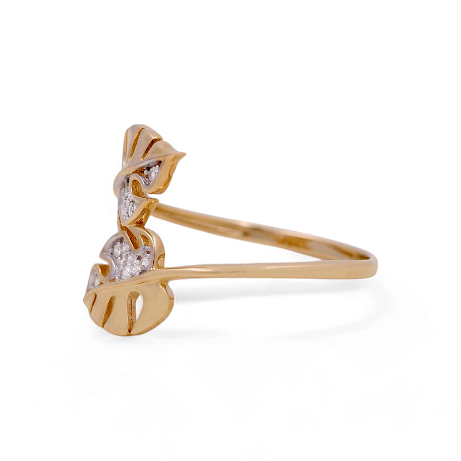 Miral Jewelry's 14K Yellow Gold Fashion Women's Ring showcases delicate leaf patterns with small gemstones, creating the perfect side view of this stunning piece of women's jewelry.