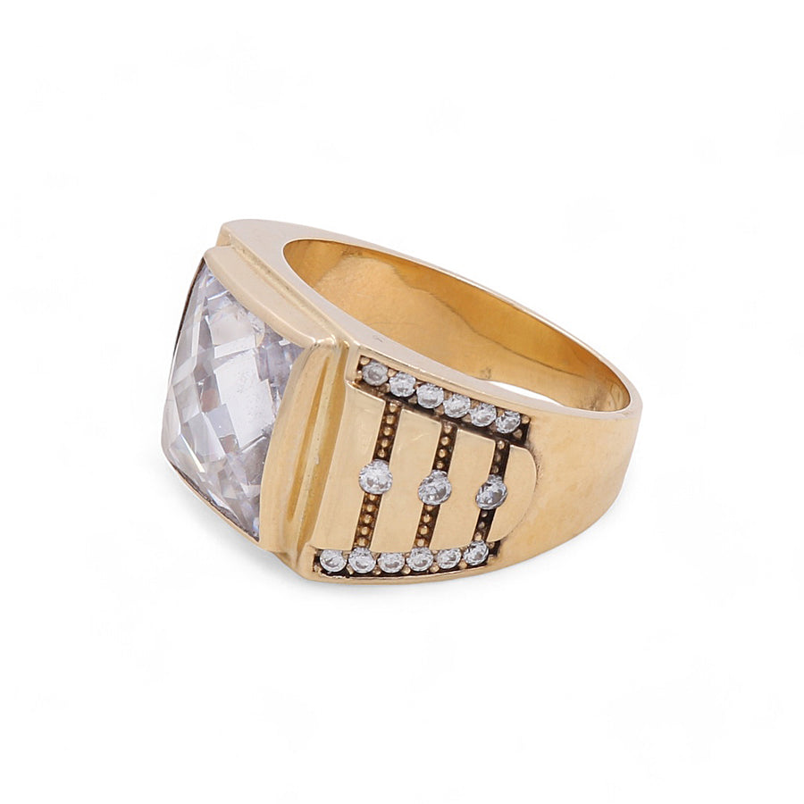 This luxurious piece from Miral Jewelry, the 14K Yellow Gold Fashion Men's Cubic Zirconias Ring, features a large rectangular clear gemstone flanked by smaller round stones set in rows on one side, all crafted in 14K yellow and white gold.