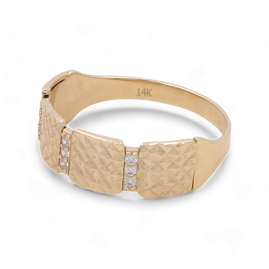 The Miral Jewelry 14K Yellow Gold Women's Fashion Ring features a textured design with small embedded diamonds, exuding luxury in every detail.