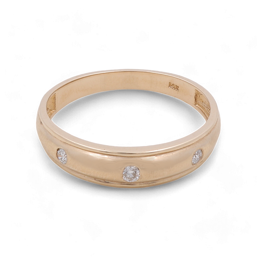 A 14K yellow gold men's wedding band from Miral Jewelry with a smooth, polished surface, featuring three evenly spaced round cubic zirconias around the band.