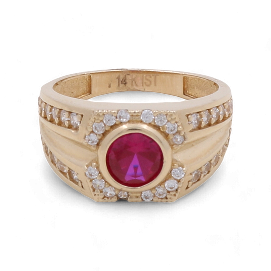 The 14K Yellow Gold Fashion Ring with Color Stone and Cubic Zirconias by Miral Jewelry showcases a central red stone encircled by sparkling cubic zirconias. The band, inscribed with "14K IST," offers an additional touch of elegance to this stunning piece.