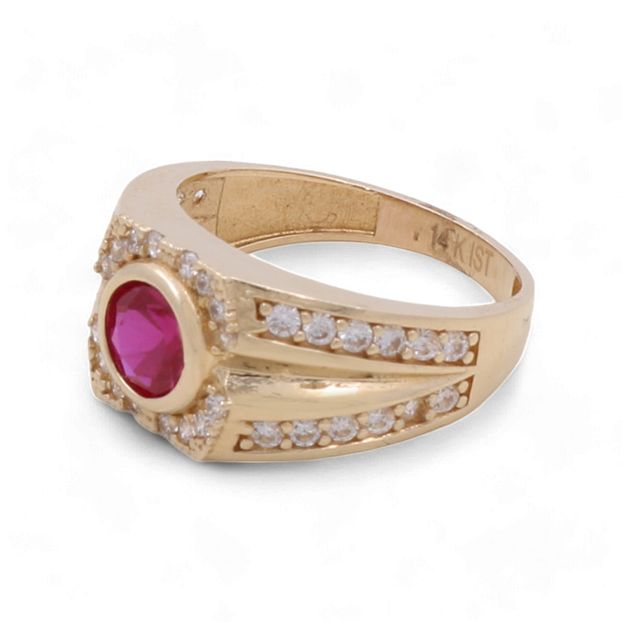 The Miral Jewelry 14K Yellow Gold Fashion Ring showcases a stunning large colorful stone at its center, elegantly encircled by small cubic zirconias. The inside of the band is meticulously stamped with "14K".