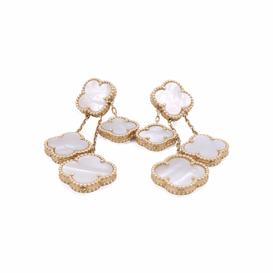 These stunning 14K Yellow Gold Fashion Flower Women's Mother of Pearl Earrings from Miral Jewelry exude elegance and charm. Featuring a clover design with mother-of-pearl inlays arranged in a cascading pattern, these gold earrings are the epitome of sophisticated style.