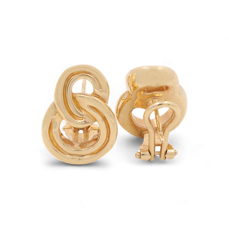 The 14K Yellow Gold Omega Back Women's Earrings by Miral Jewelry, featuring an intertwined loops design, are showcased from front and back angles on a white background; the perfect addition to your collection of Fashion Jewelry.