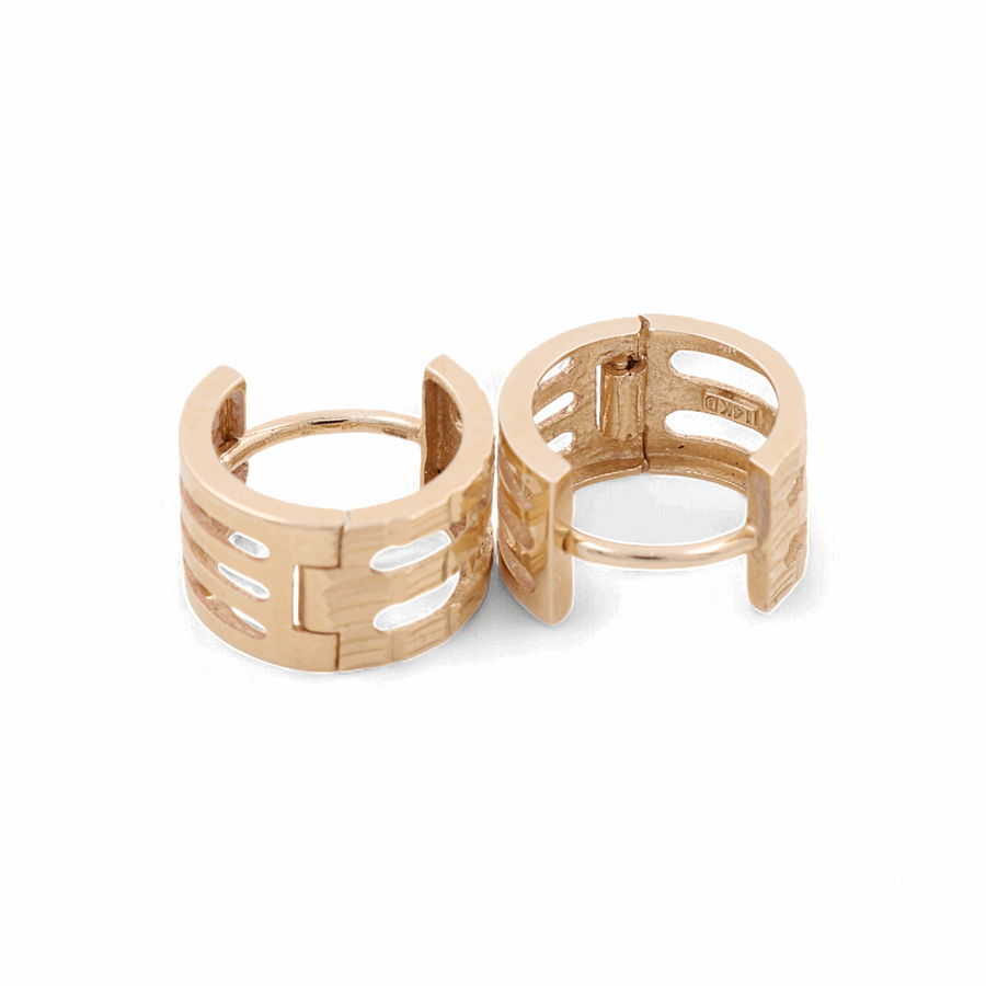 Two 14K yellow gold fashion hoop women's earrings by Miral Jewelry, featuring cylindrical ring bands with rectangular cut-out designs, are positioned side by side on a white background.