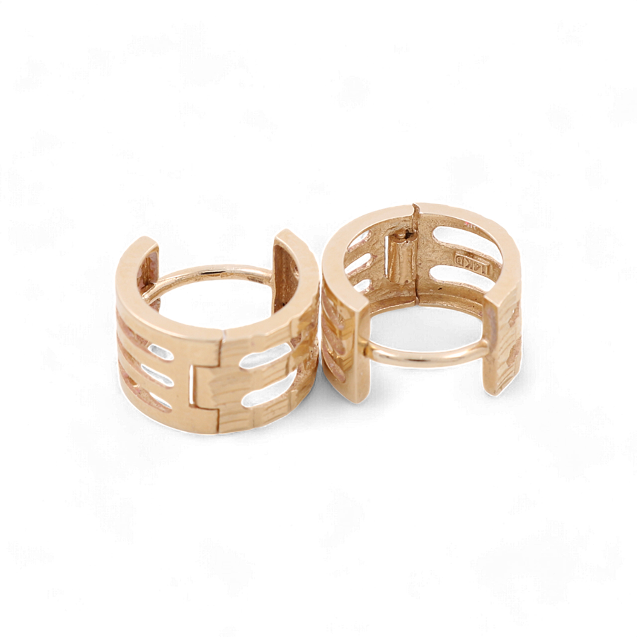 Two 14K yellow gold fashion hoop women's earrings by Miral Jewelry, featuring cylindrical ring bands with rectangular cut-out designs, are positioned side by side on a white background.