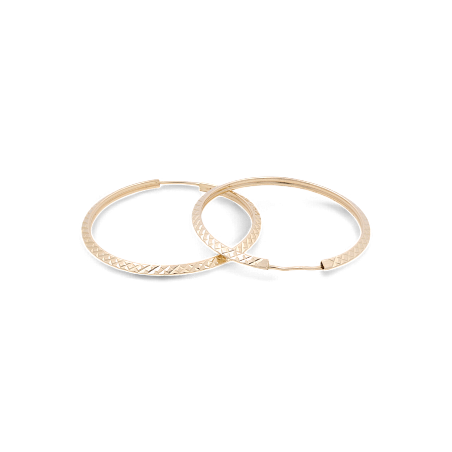 The 14k Yellow Gold Medium Hoop Women's Earrings from Miral Jewelry boast a textured design that exudes luxury and elegance against a white background.