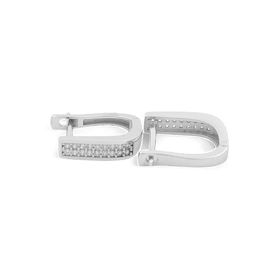 Two Miral Jewelry 14K White Gold Huggie Women's Earrings lie flat, showcasing a row of small, embedded cz stones on one side of each earring.