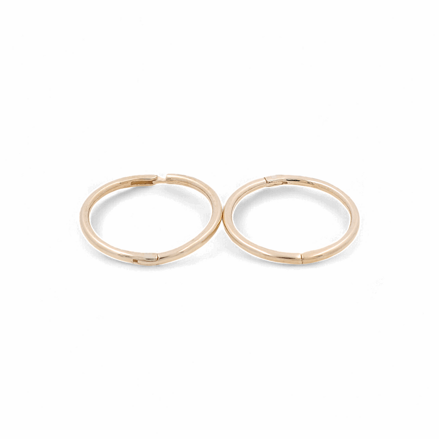 A pair of small, simple 14K Yellow Fashion Hoops Earrings by Miral Jewelry, with a gold finish on a white background, perfect for any jewelry collection.