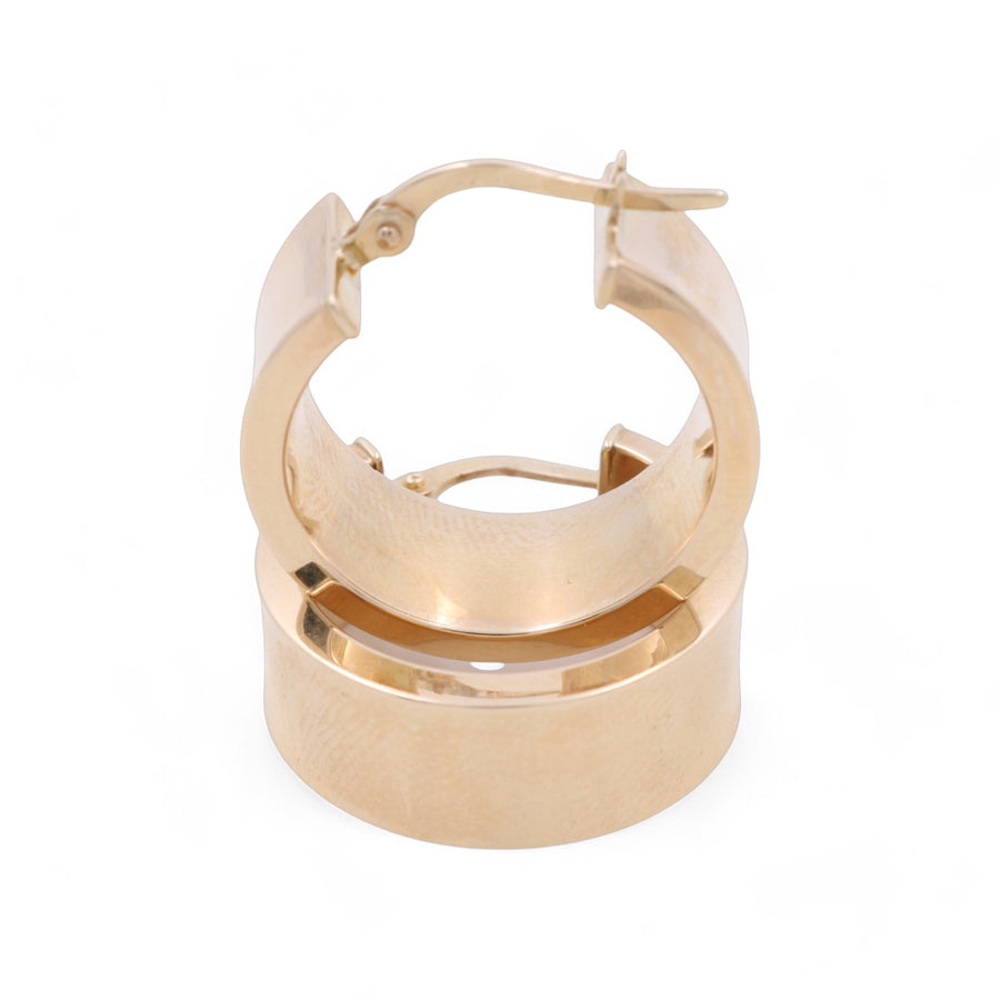 A pair of 14K Yellow Fashion Hoop Earrings by Miral Jewelry, featuring a stylish design and latch-back closure, displayed against a white background.