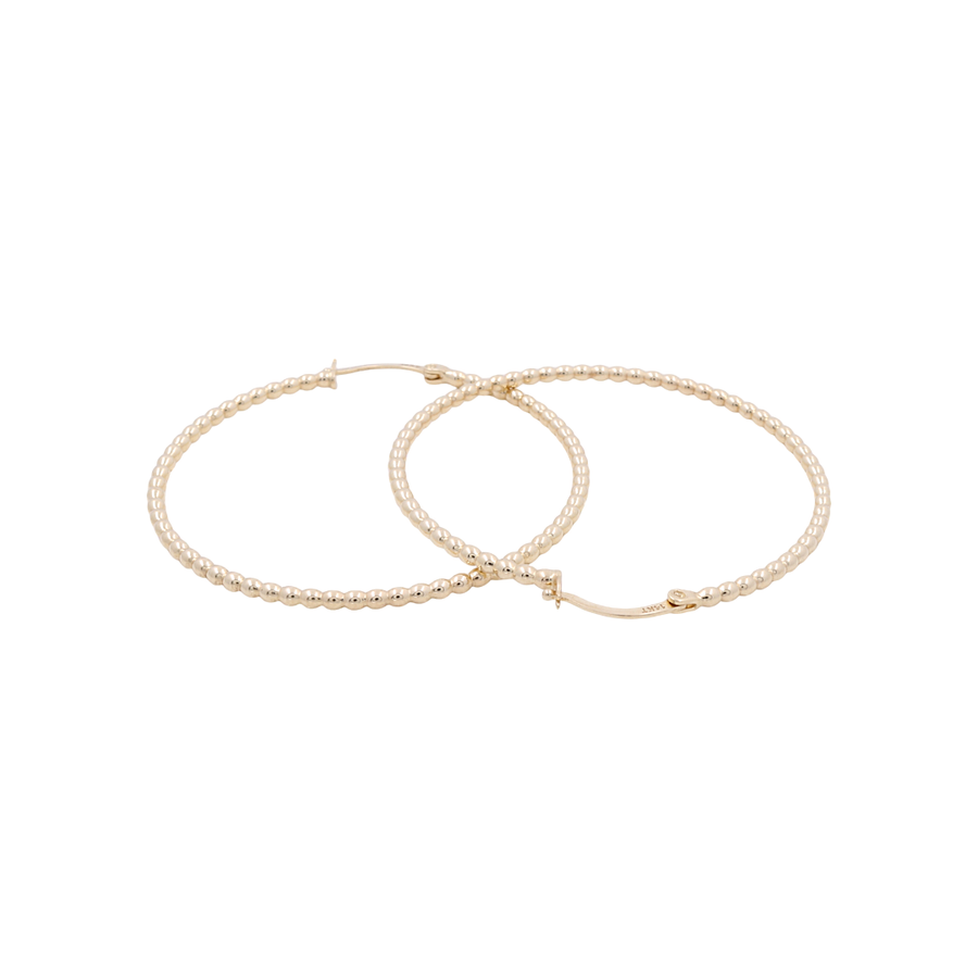 The Miral Jewelry 14K Yellow Fashion Twisted Hoops Earrings feature a stunning twisted design, adorned with small pearls lining the outer edge, and each earring is equipped with a clasp for secure fastening.