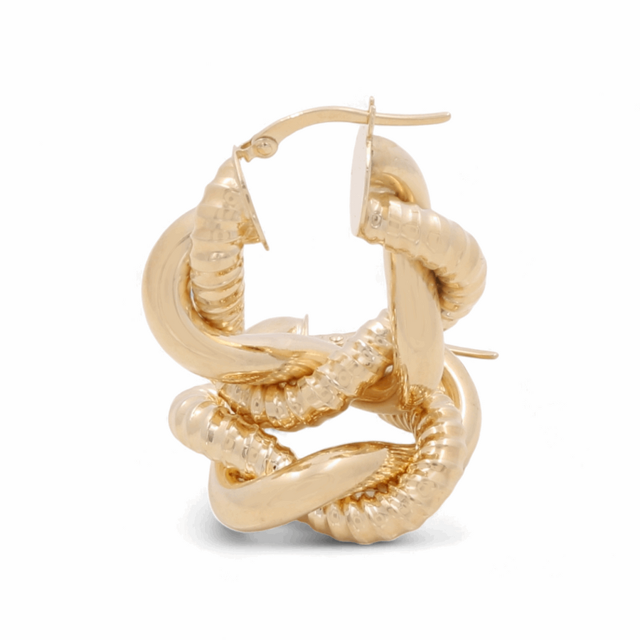 A pair of 14K Yellow Fashion Hoop Earrings by Miral Jewelry, showcasing a twisted, coiled serpent-like design that emanates timeless beauty and crafted from high-quality gold, positioned upright against a white background.