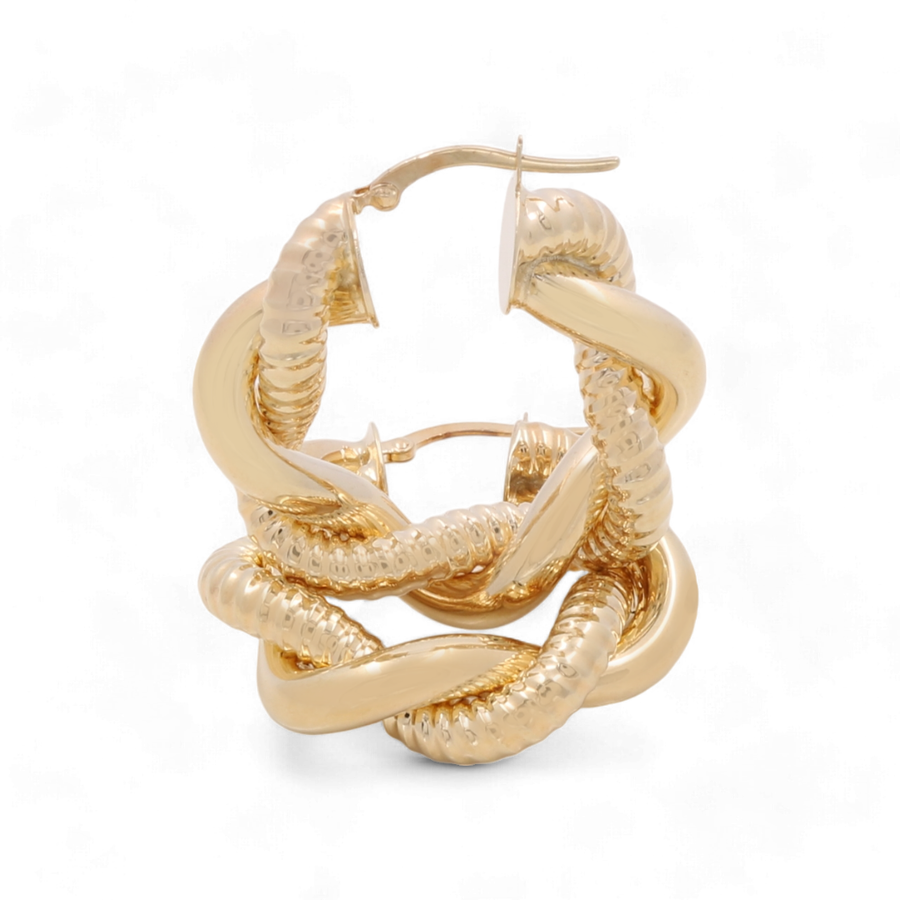 A luxurious and sophisticated pair of Miral Jewelry 14K Yellow Fashion Hoop Earrings, featuring an intertwined design with both textured and smooth finishes, elegantly showcased on a white background.