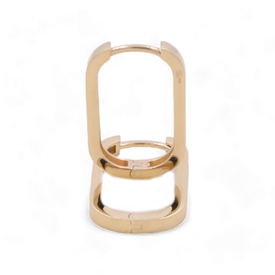 Gold rectangular buckle with a hinged clasp, standing upright against a white background, reminiscent of the delicate sophistication found in Miral Jewelry's 14K Yellow Fashion Link Hoop Earrings.