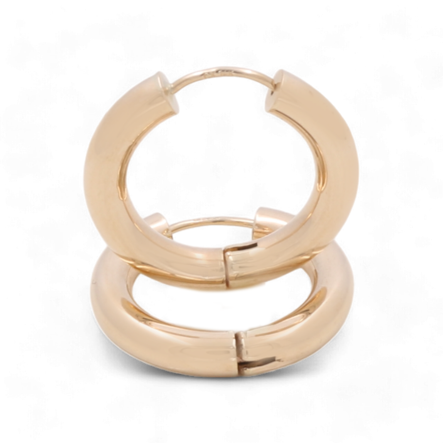 Two 14K yellow fashion hoop earrings by Miral Jewelry, stacked on top of each other on a white background, exude the timeless allure of classic hoop design—perfect for those who appreciate luxury accessories.