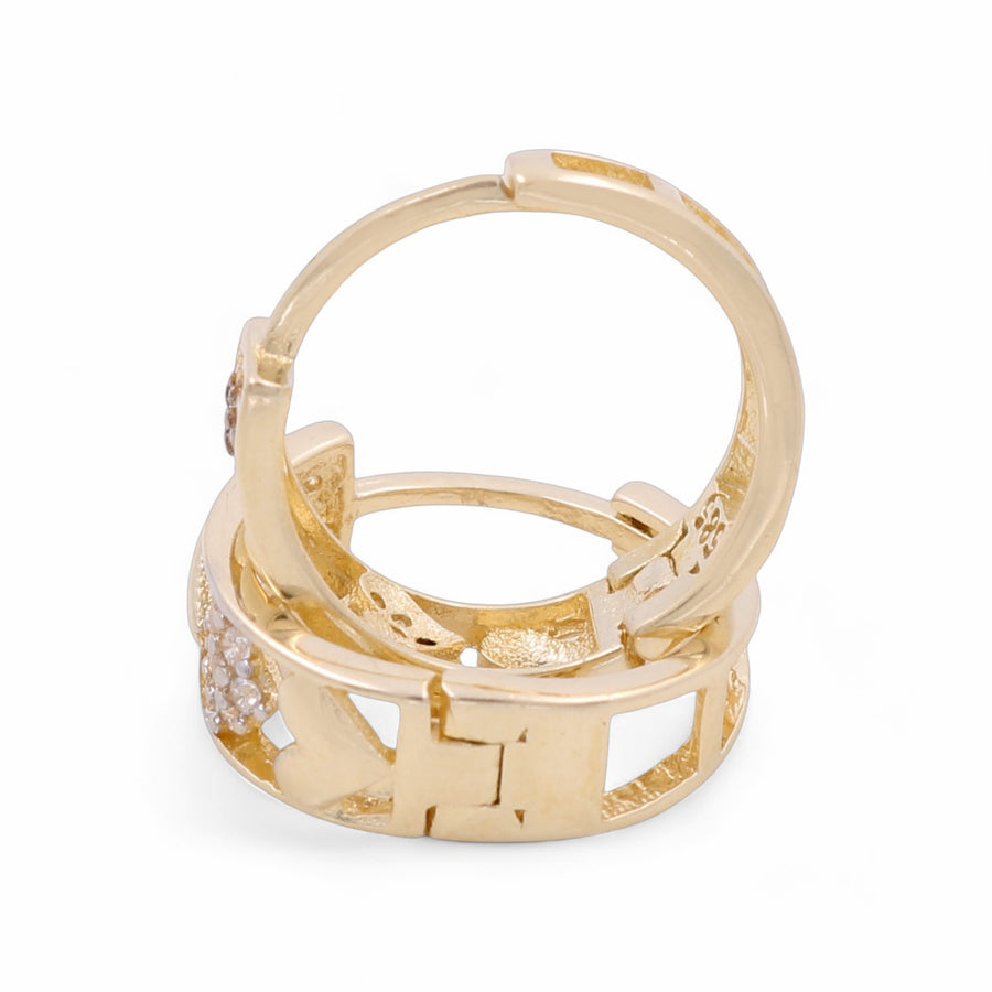 Miral Jewelry’s 14K Yellow Gold Hoops Women's Earrings feature two interlocked rings, one with a geometric design and the other embellished with small diamonds.