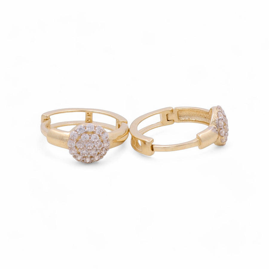 Miral Jewelry's 14K Yellow Gold Small Hoop Women's Earrings feature diamond-encrusted circular designs on a white background.