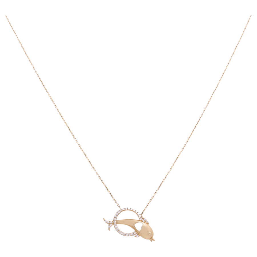 A delicate 14K Yellow Gold Dolphin Heart Necklace by Miral Jewelry featuring a dolphin-shaped pendant adorned with small gemstones, exemplifying elegant gold jewelry.