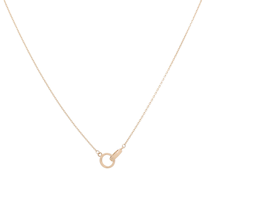 The 14K Yellow Gold Intertwined Hoops Necklace by Miral Jewelry features a delicate chain and intertwined circular pendants, epitomizing elegant gold jewelry.