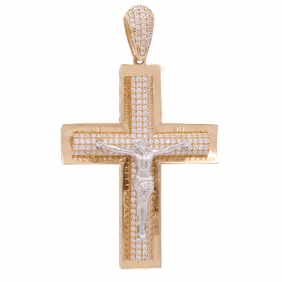 Miral Jewelry's 14K Yellow Gold Cross with Zirconias Pendant, adorned with shimmering zirconias and featuring a silver figure of Jesus in the center.