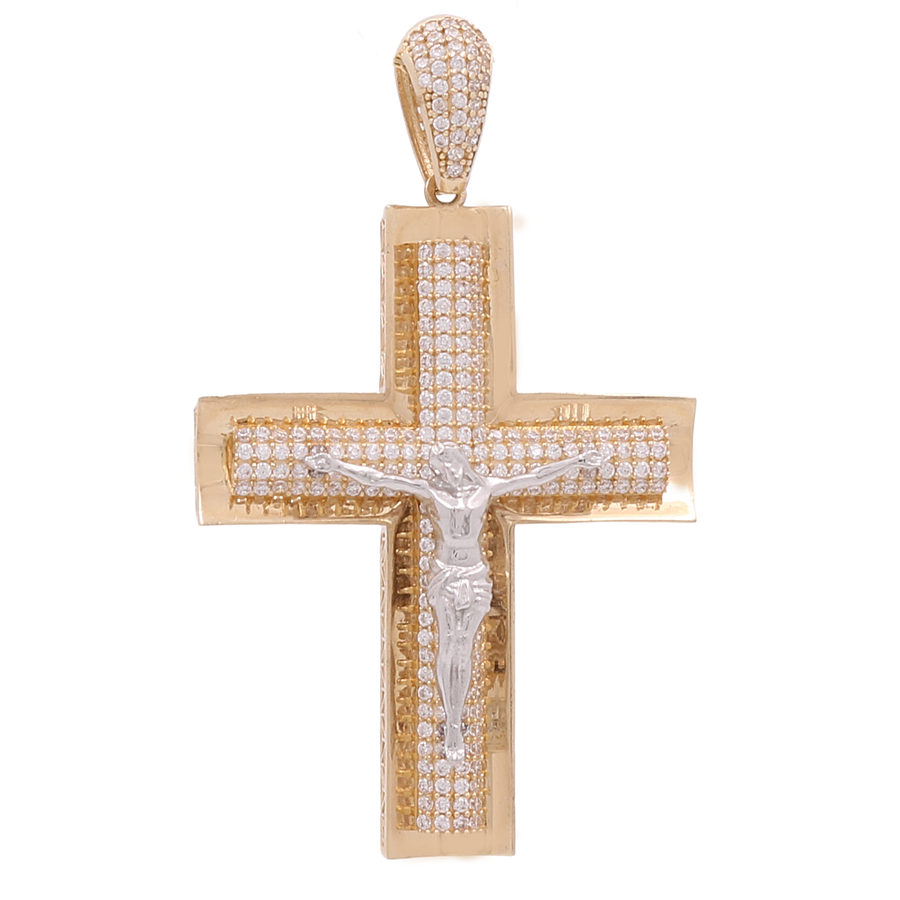 Miral Jewelry's 14K Yellow Gold Cross with Zirconias Pendant, adorned with shimmering zirconias and featuring a silver figure of Jesus in the center.