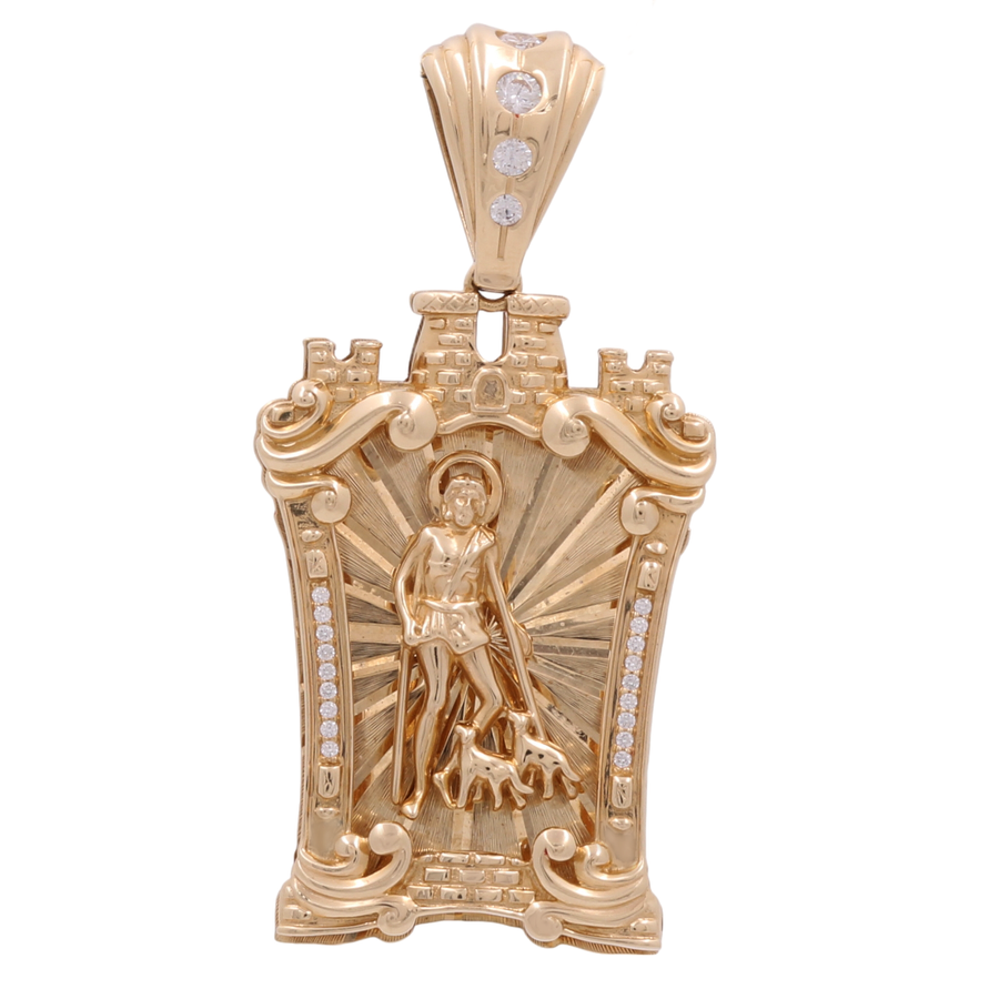 14K Yellow Gold Religious Pendant with Zirconias by Miral Jewelry, featuring a detailed figure of a person with a dog, surrounded by ornate designs and adorned with small gemstones.