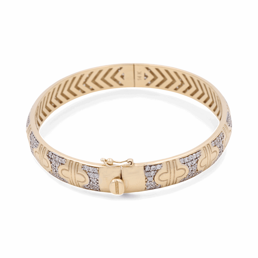 Introducing the 14K Yellow Gold Fashion Bracelet by Miral Jewelry, a stunning accessory with intricate engravings and diamond-like embellishments, perfect for any jewelry collection.