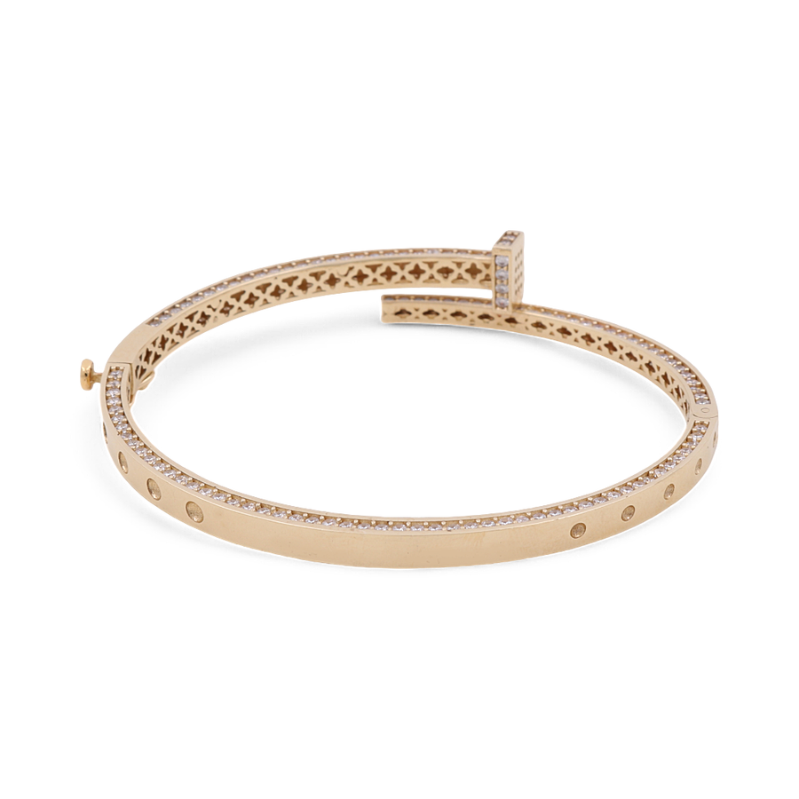 The Miral Jewelry 14K Yellow Gold Fashion Bracelet features cubic zirconia accents and a clasp, making it a fashion-forward accessory.