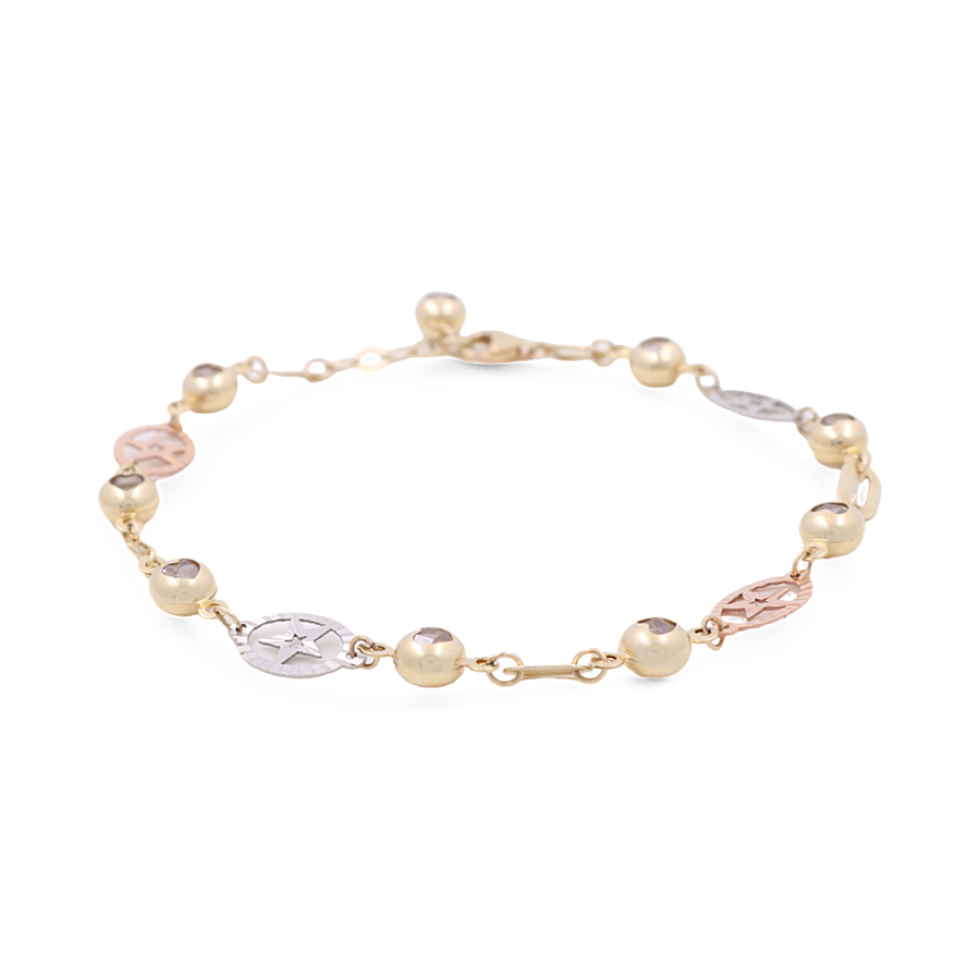 Introducing the Tri-color 14k Fashion Bracelet by Miral Jewelry, this exquisite piece features a combination of round beads and star-shaped links in stunning gold, silver, and rose gold tones, secured with a clasp.