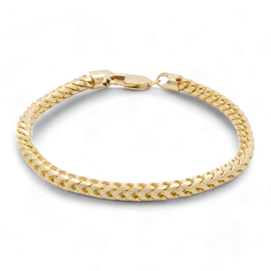 A 14K Yellow Gold Fashion Links Italian Bracelet by Miral Jewelry featuring a sleek, woven design and a secure clasp, displayed on a white background. This Italian fashion links bracelet adds timeless elegance to any ensemble.