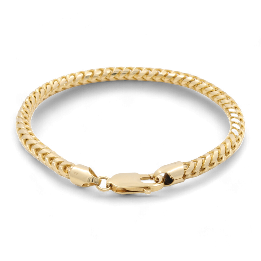 A close-up photograph of an elegant 14K Yellow Gold Fashion Links Italian Bracelet by Miral Jewelry with a clasp closure, displayed on a white background. The intricate design of the Italian fashion links enhances its luxurious appeal.