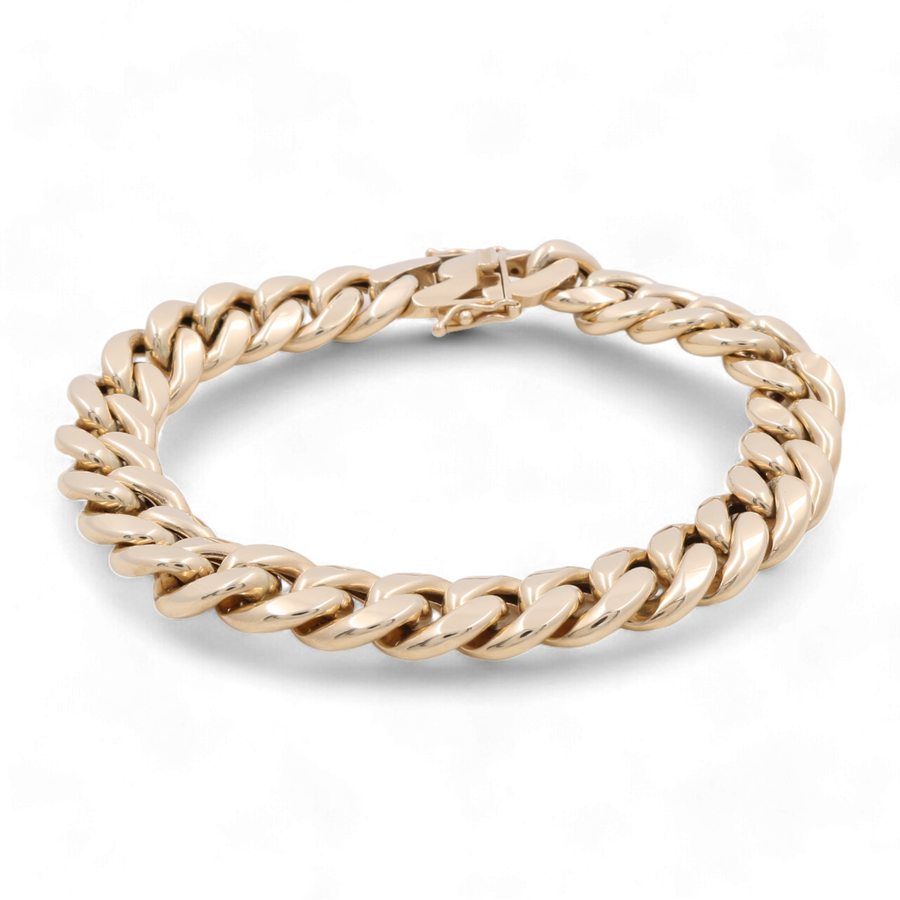 Miral Jewelry 14K Yellow Gold Fashion Cuban Links Bracelet with a clasp, featuring large, interlocking links in 14K Yellow Gold.