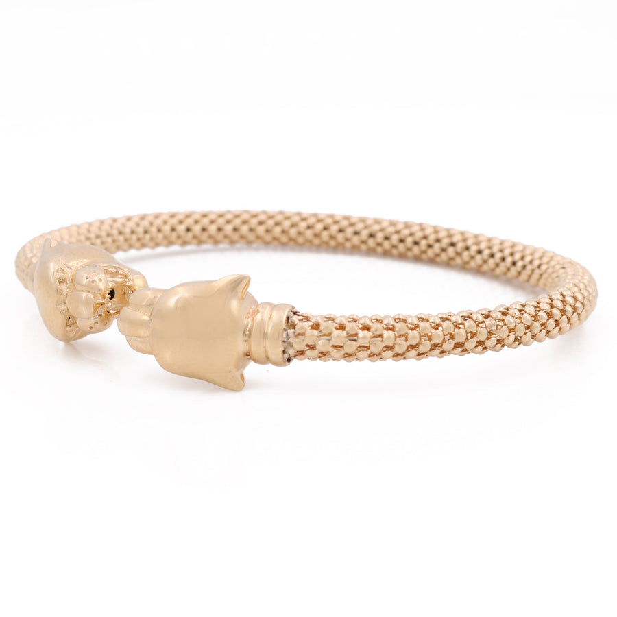 A Miral Jewelry 14K Yellow Gold Panther and Mesh Bracelet with a skull clasp and 14K yellow gold accents.