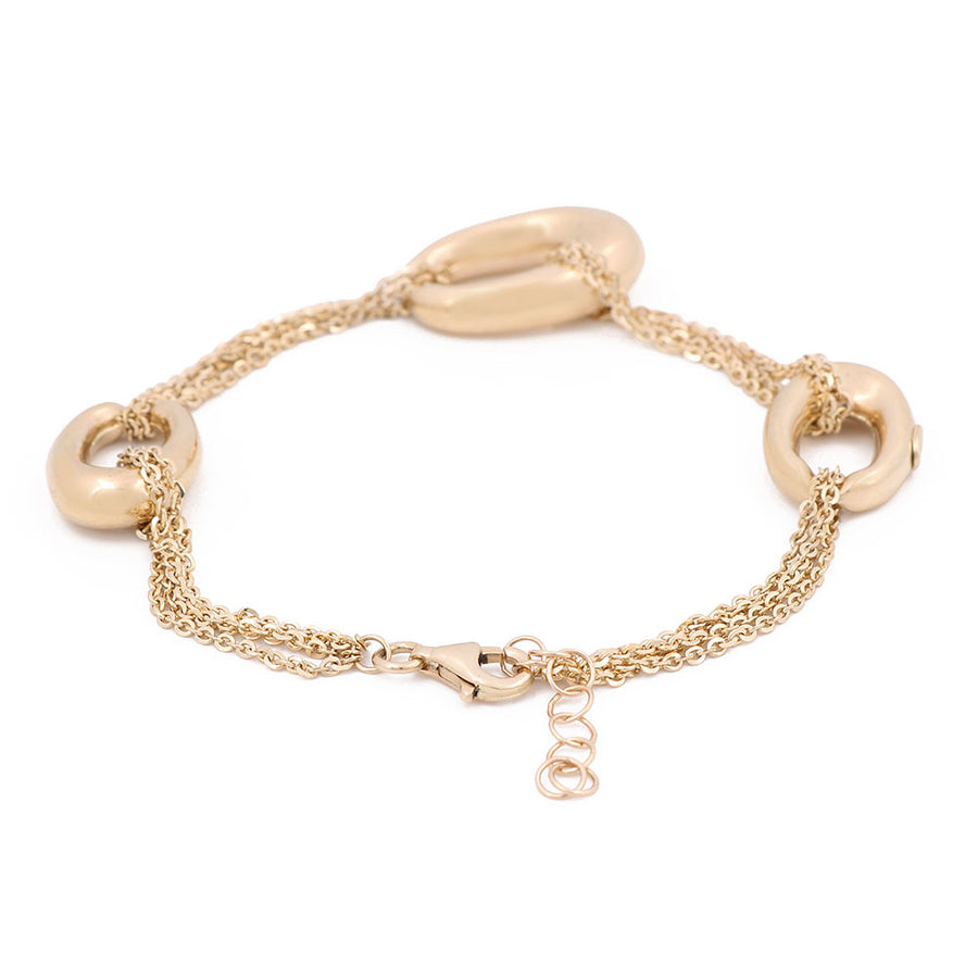 A 14K Yellow Gold Mesh and Loops Bracelet with a Miral Jewelry clasp.