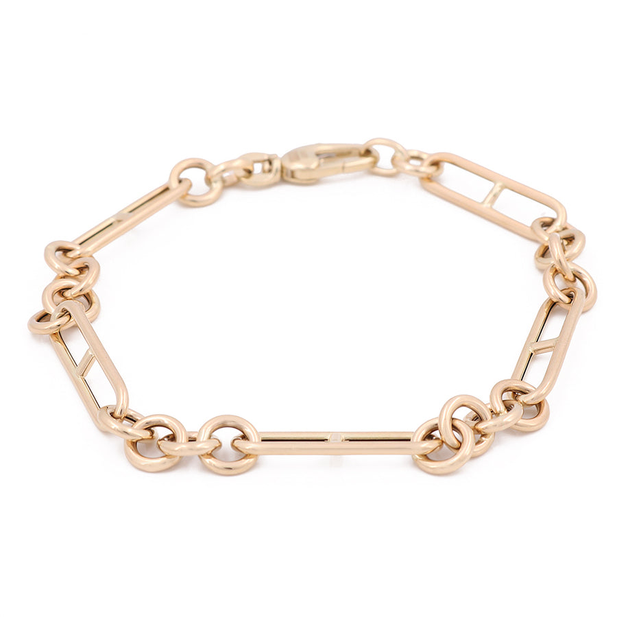 A timeless glamour 14K Yellow Gold Pins Links Bracelet with an oval link by Miral Jewelry.