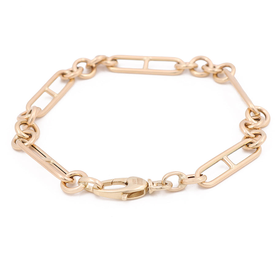 A Miral Jewelry 14K Yellow Gold Pins Links Bracelet, exuding timeless glamour with its gold plated finish and stylish link clasp.