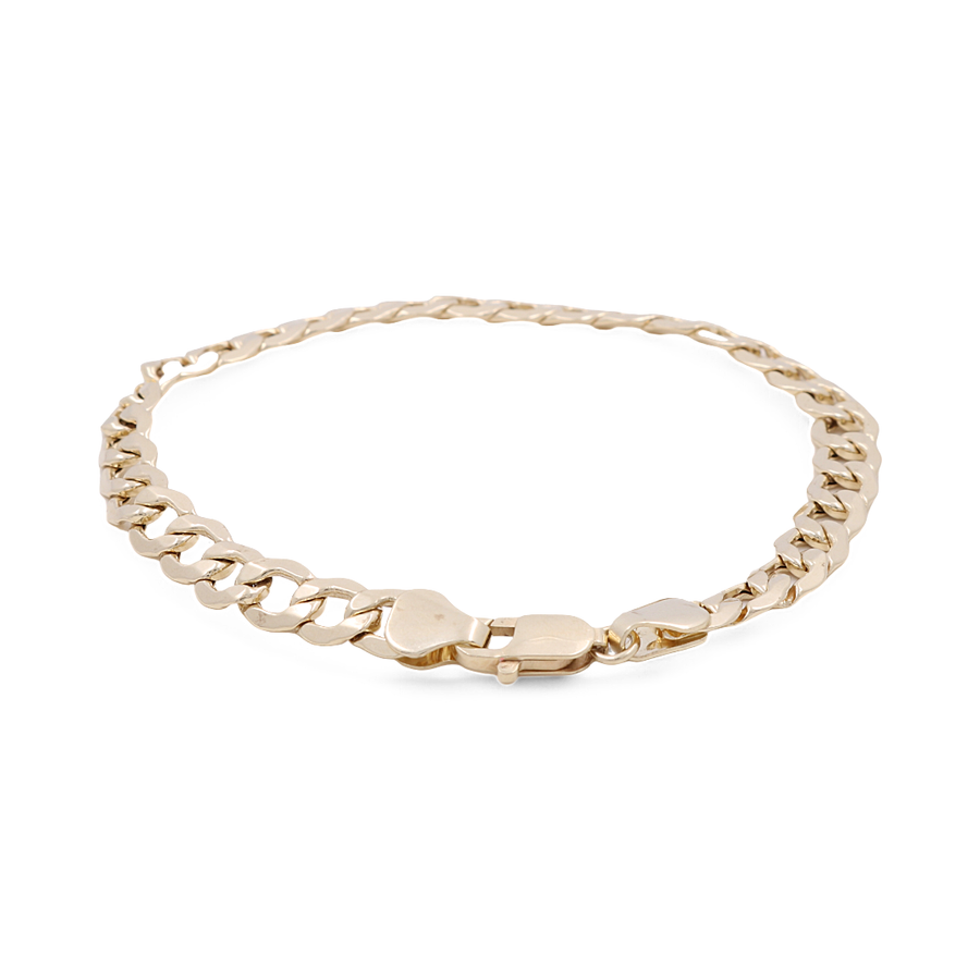 The Miral Jewelry 14K Yellow Gold Women's Fashion Curb Link Bracelet, featuring a lobster clasp closure, is displayed against a plain white background. This elegant bracelet adds a touch of sophistication to any outfit.