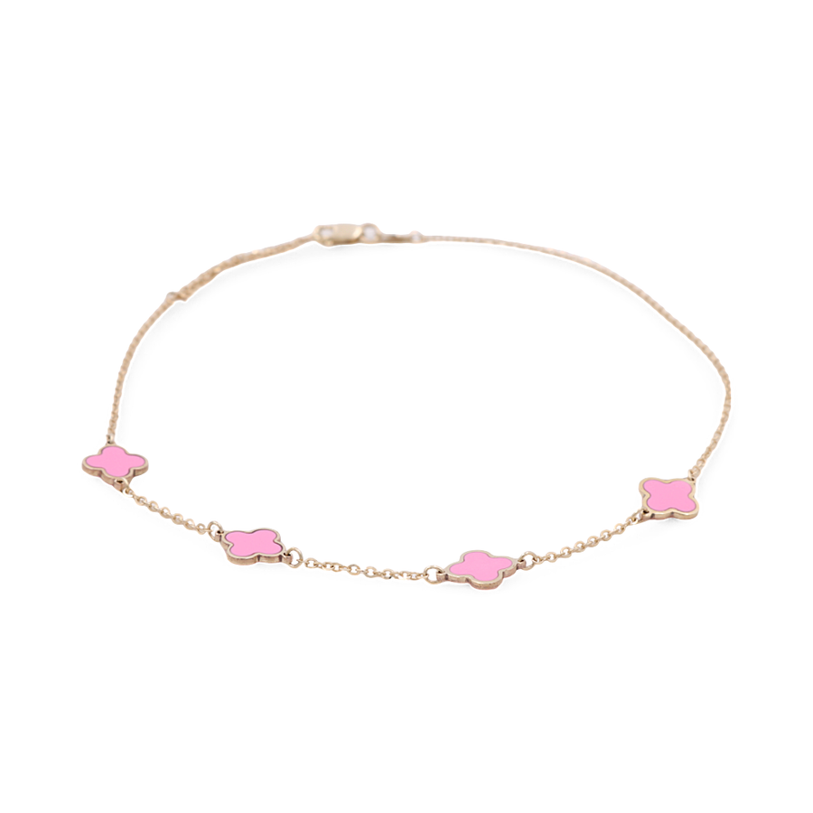 Part of Miral Jewelry's exclusive collection, the Yellow Gold 14k Fashion Ankle Bracelet features four pink flower-shaped charms evenly spaced to add a touch of elegance and whimsy.